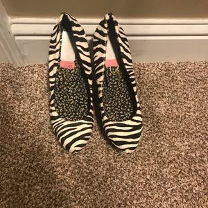 Zebra print suede pumps